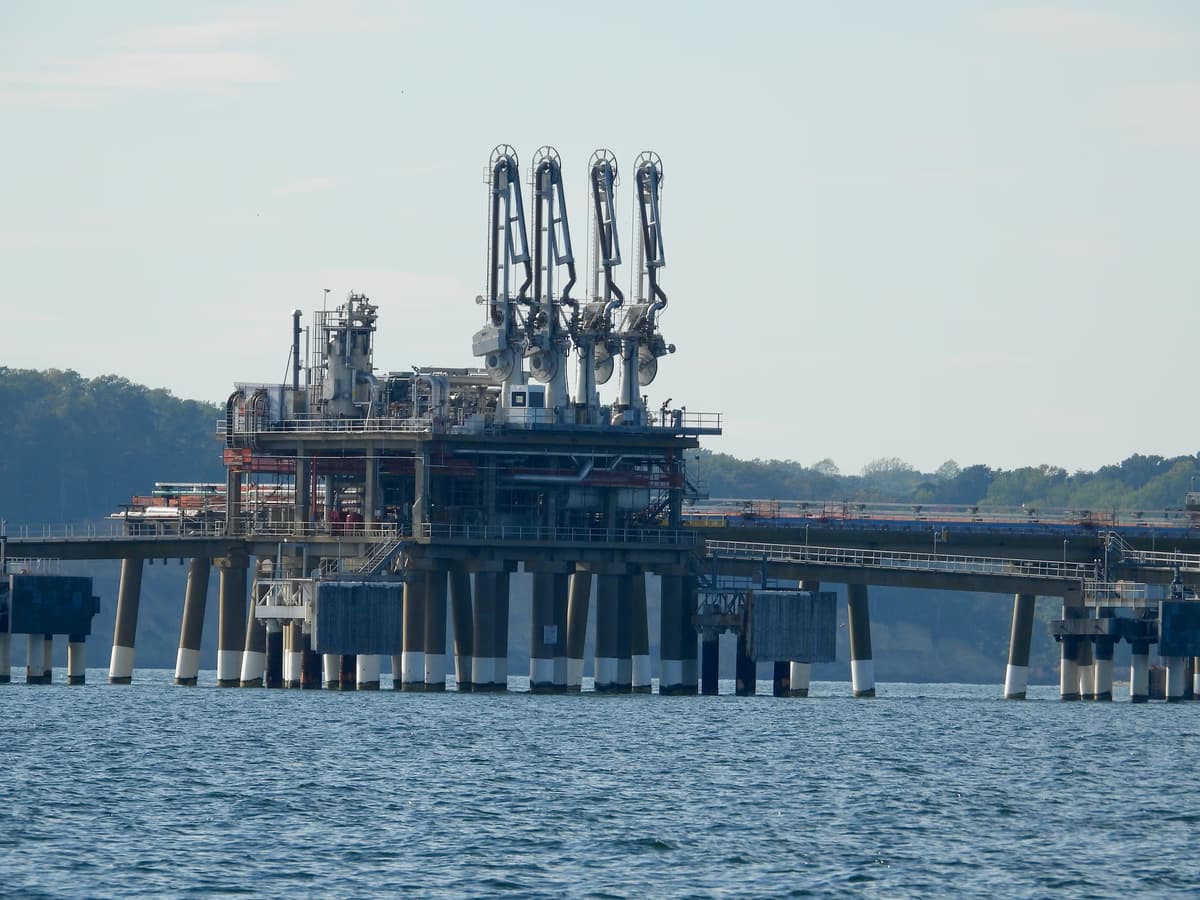 Cove Point LNG Terminal in Maryland showing export facility storage tanks and marine dock