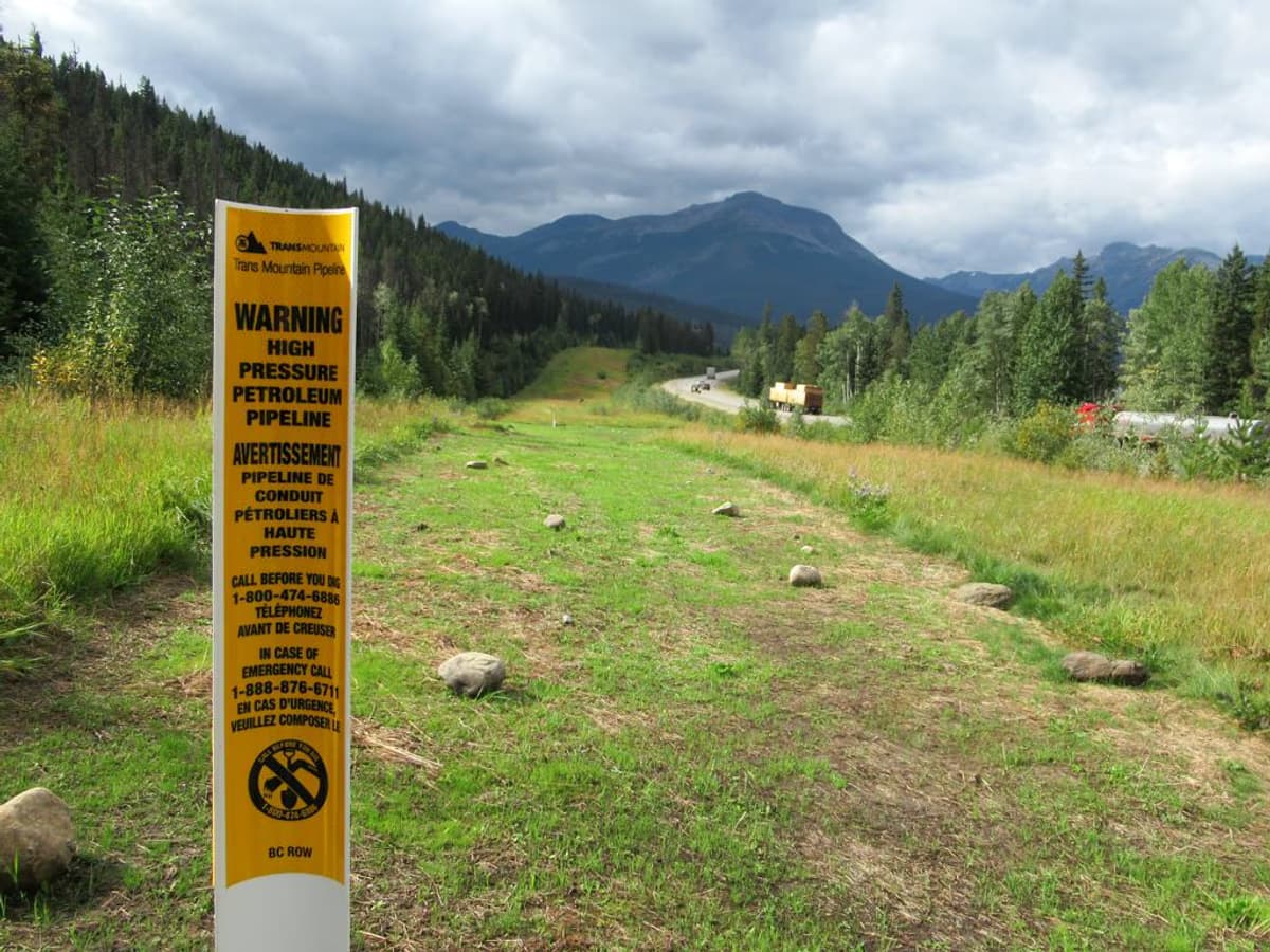 Trans Mountain Pipeline running alongside the Yellowhead Highway carrying crude oil from Edmonton toward Burnaby in western Canada