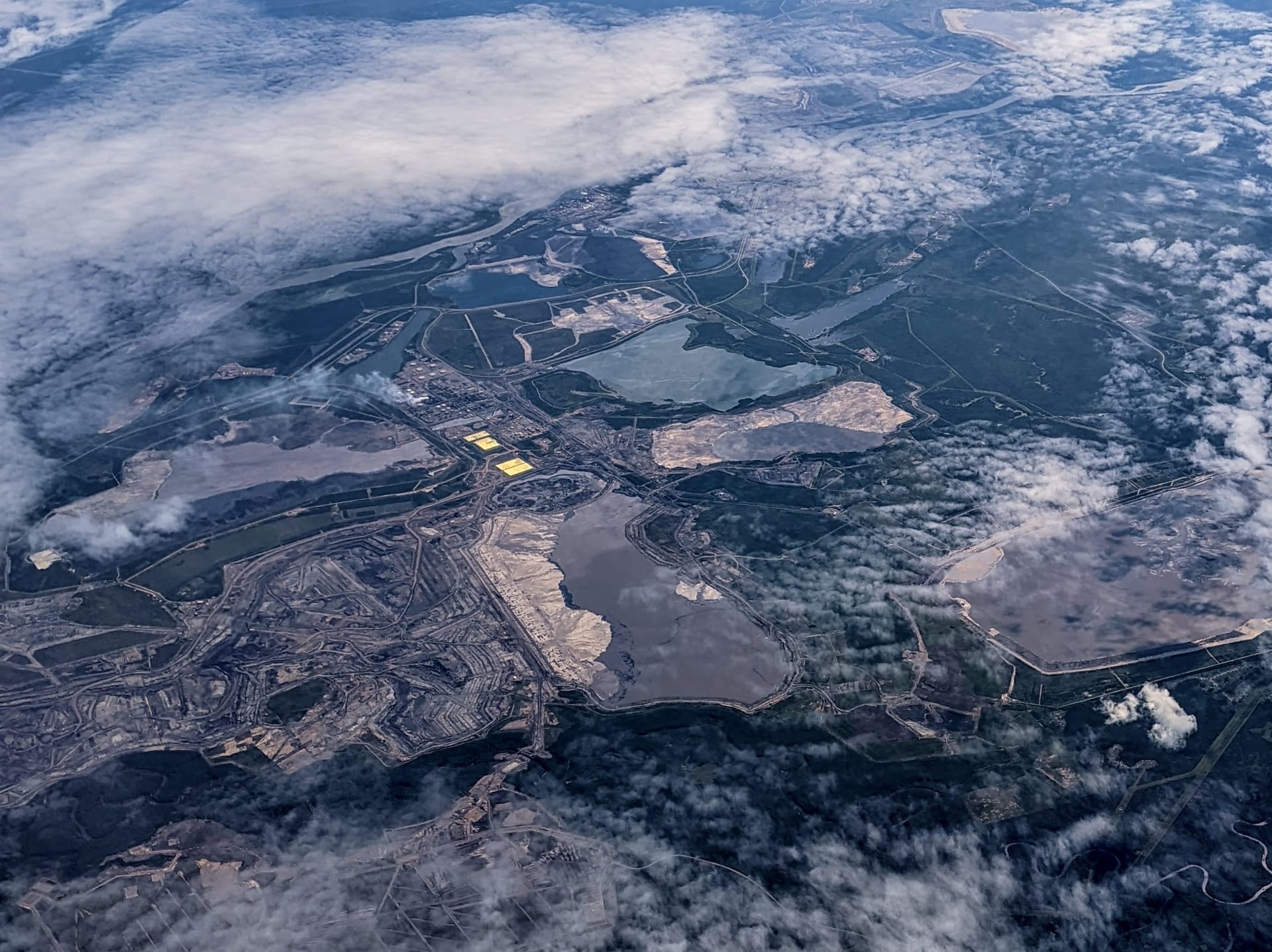 Syncrude oil sands mining complex and tailings ponds at Mildred Lake Alberta